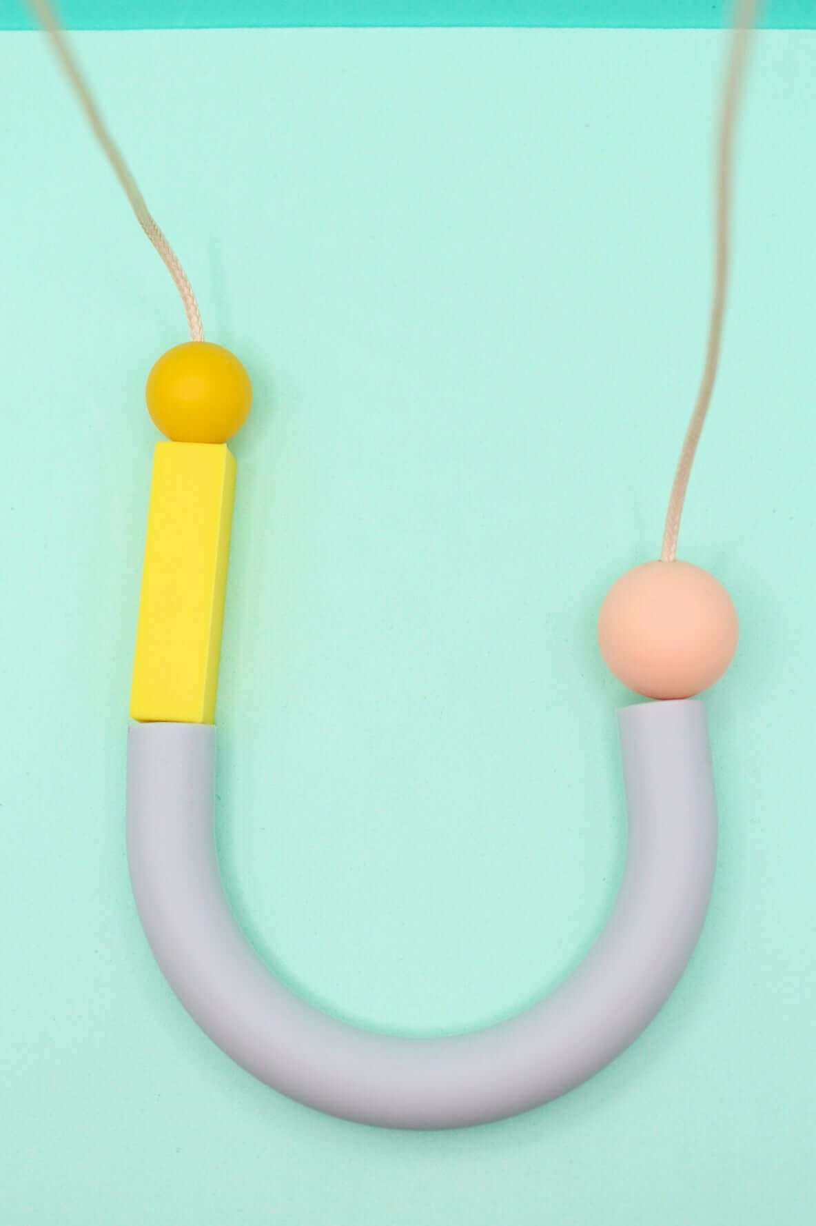 Asymmetrical Dove Grey U Shape Silicone Necklace | Lightweight and Chewable