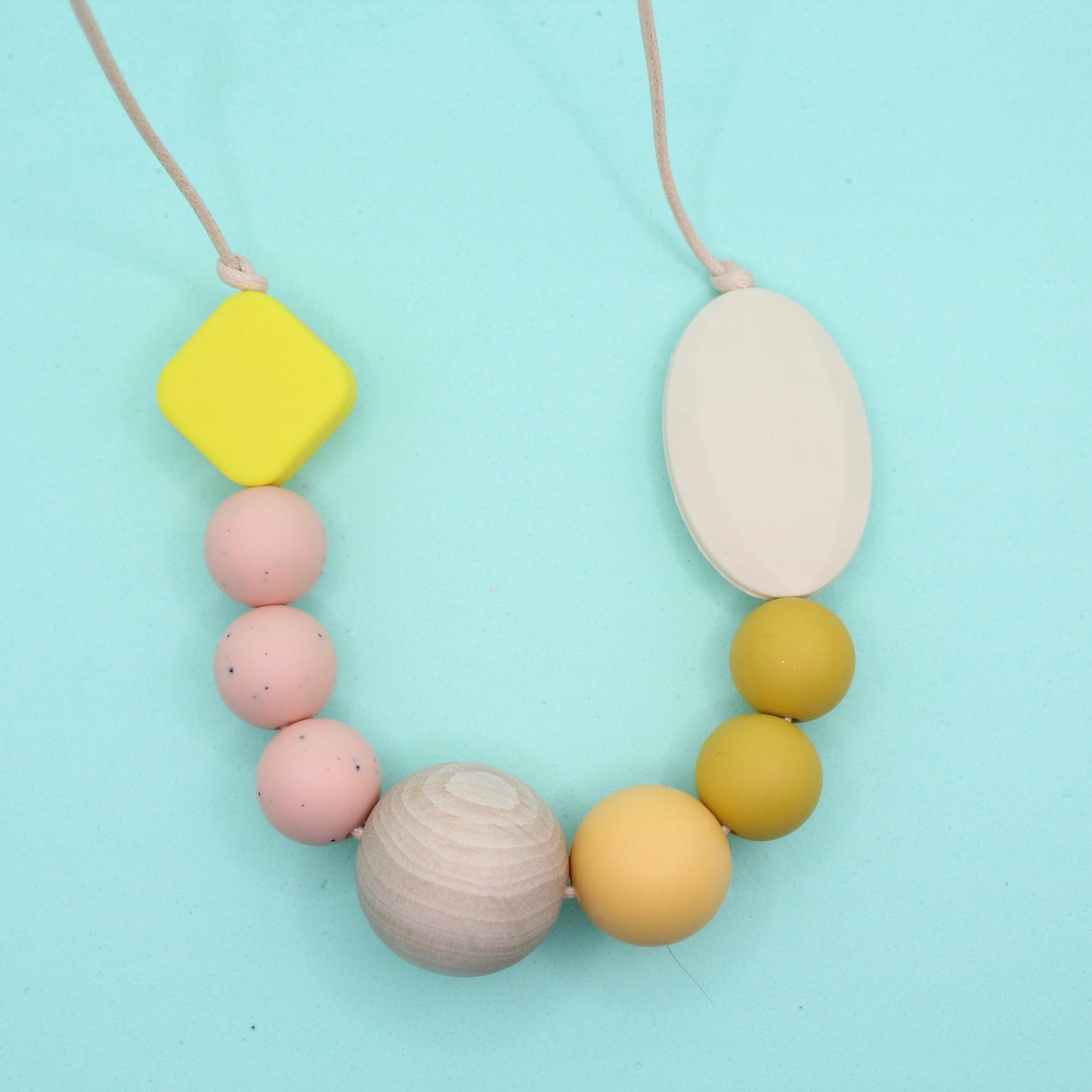 Mixed bead silicone sensory necklace for ADHD and autistic adults to fiddle or chew.