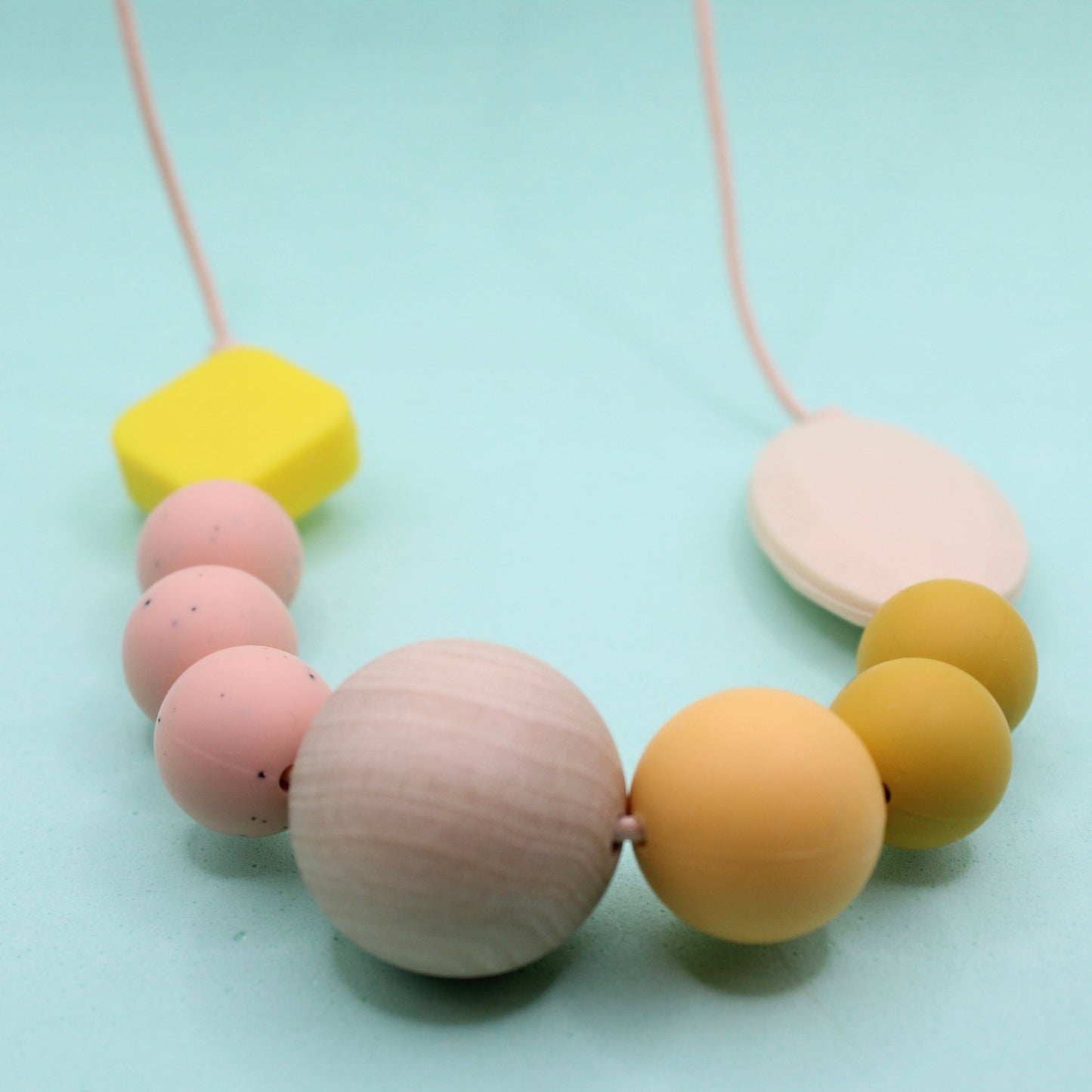 Mixed bead silicone sensory necklace for ADHD and autistic adults to fiddle or chew.