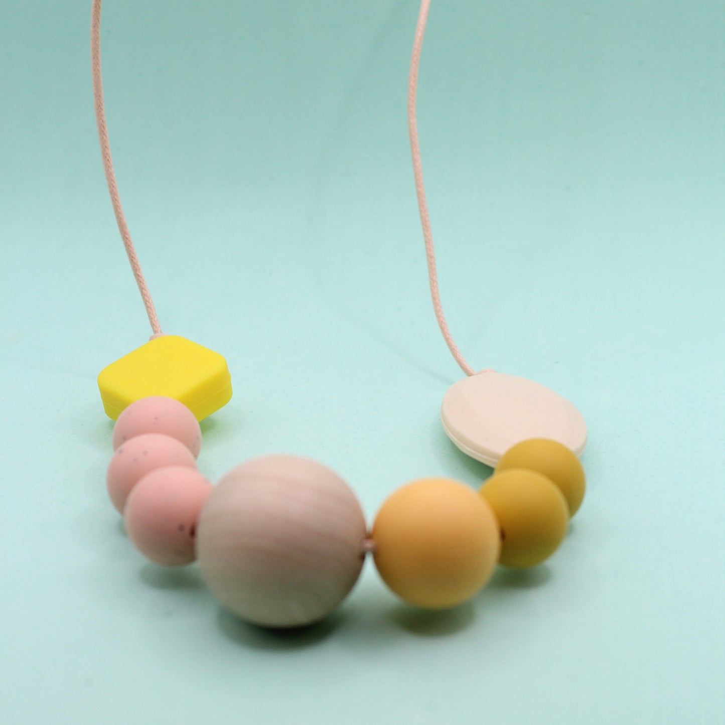 Mixed bead silicone sensory necklace for ADHD and autistic adults to fiddle or chew.