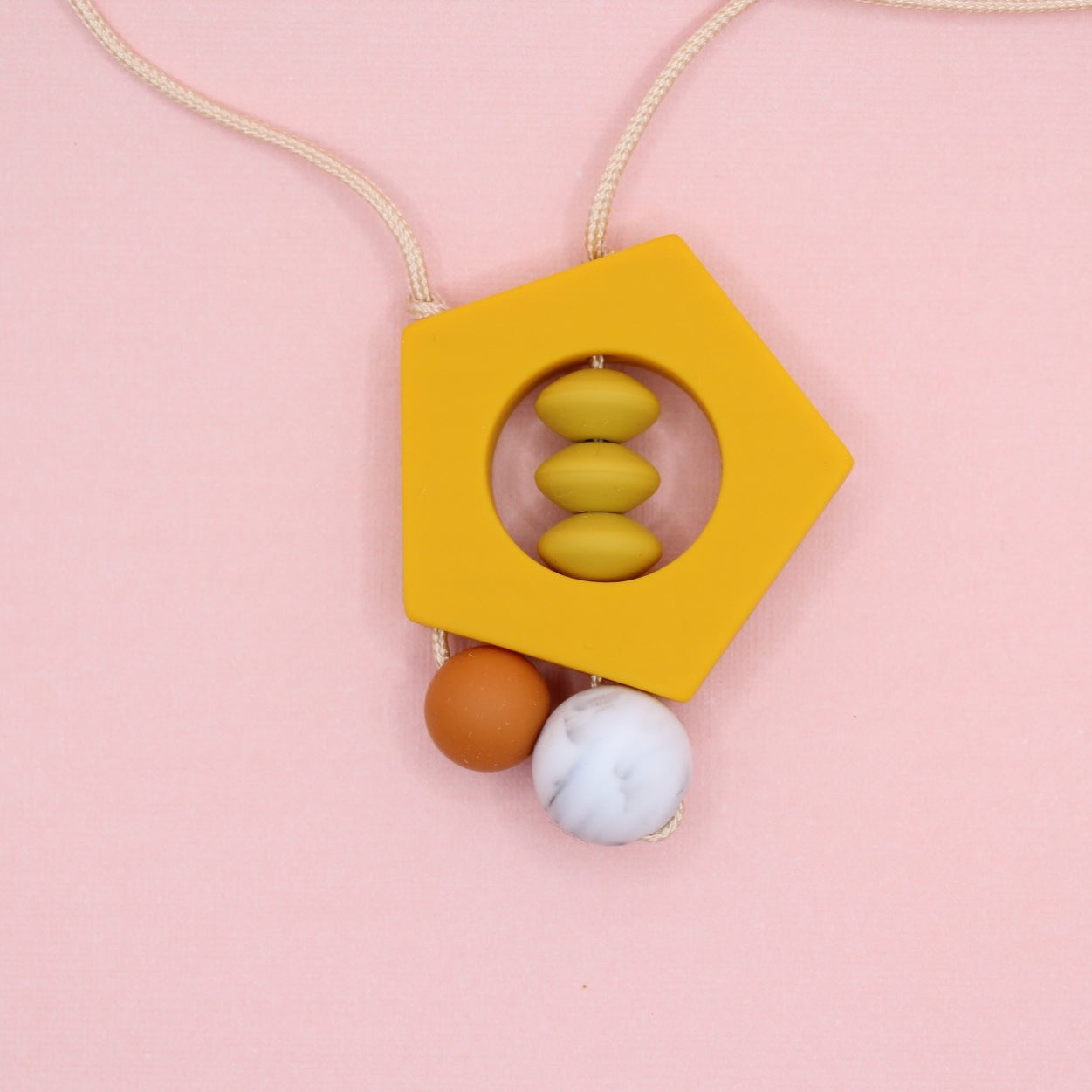 'Penny' Amber Yellow Pentagon Silicone Pendant Necklace - Mustard, Burnt Orange and Marble