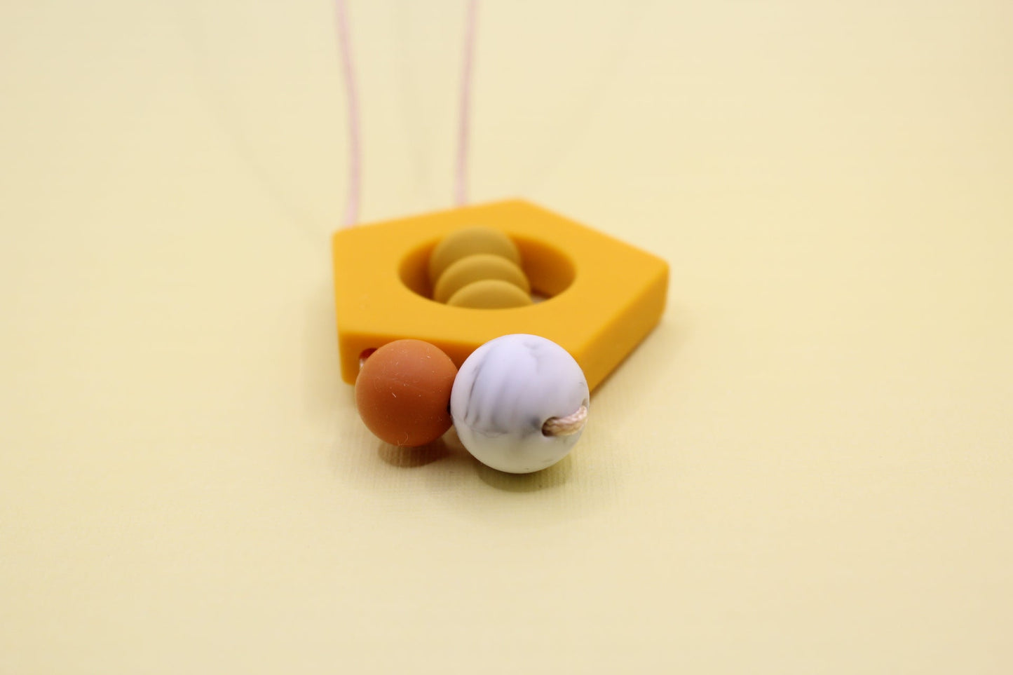 'Penny' Amber Yellow Pentagon Silicone Pendant Necklace